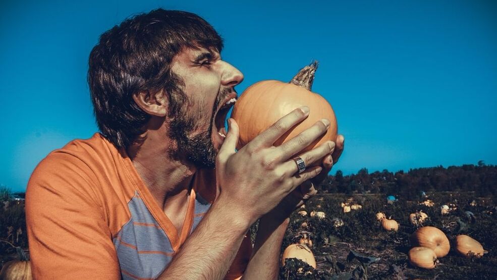 A man eats pumpkin to increase potency